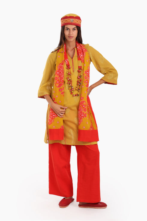Embroidery tunic with contrast color piping in printed cotton voile